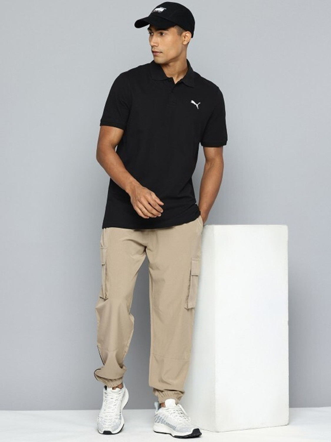 Image of PUMA Solid Men Polo Neck Black T-Shirt