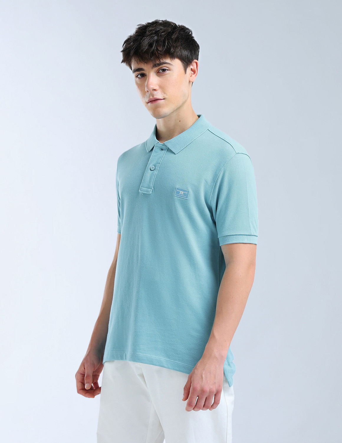 Image of FLYING MACHINE Solid Men Polo Neck Blue T-Shirt
