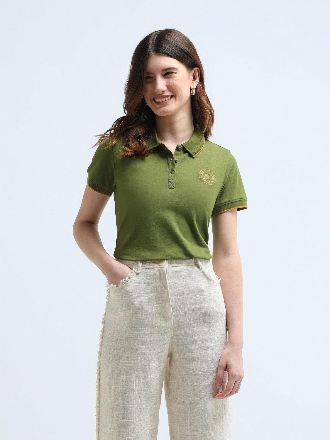 Image of U.S. POLO ASSN. Solid Women Polo Neck Green T-Shirt