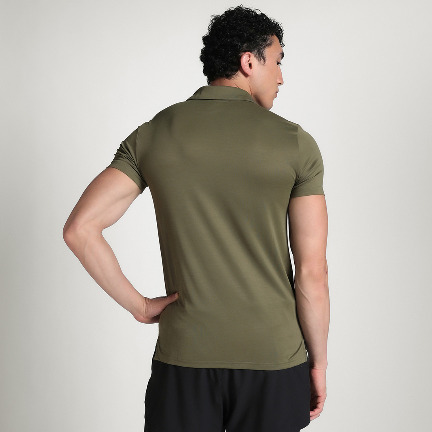 Image of PUMA Solid Men Polo Neck Green T-Shirt