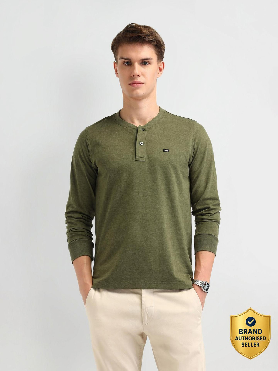 Image of Arrow Sport Solid Men Henley Neck Green T-Shirt