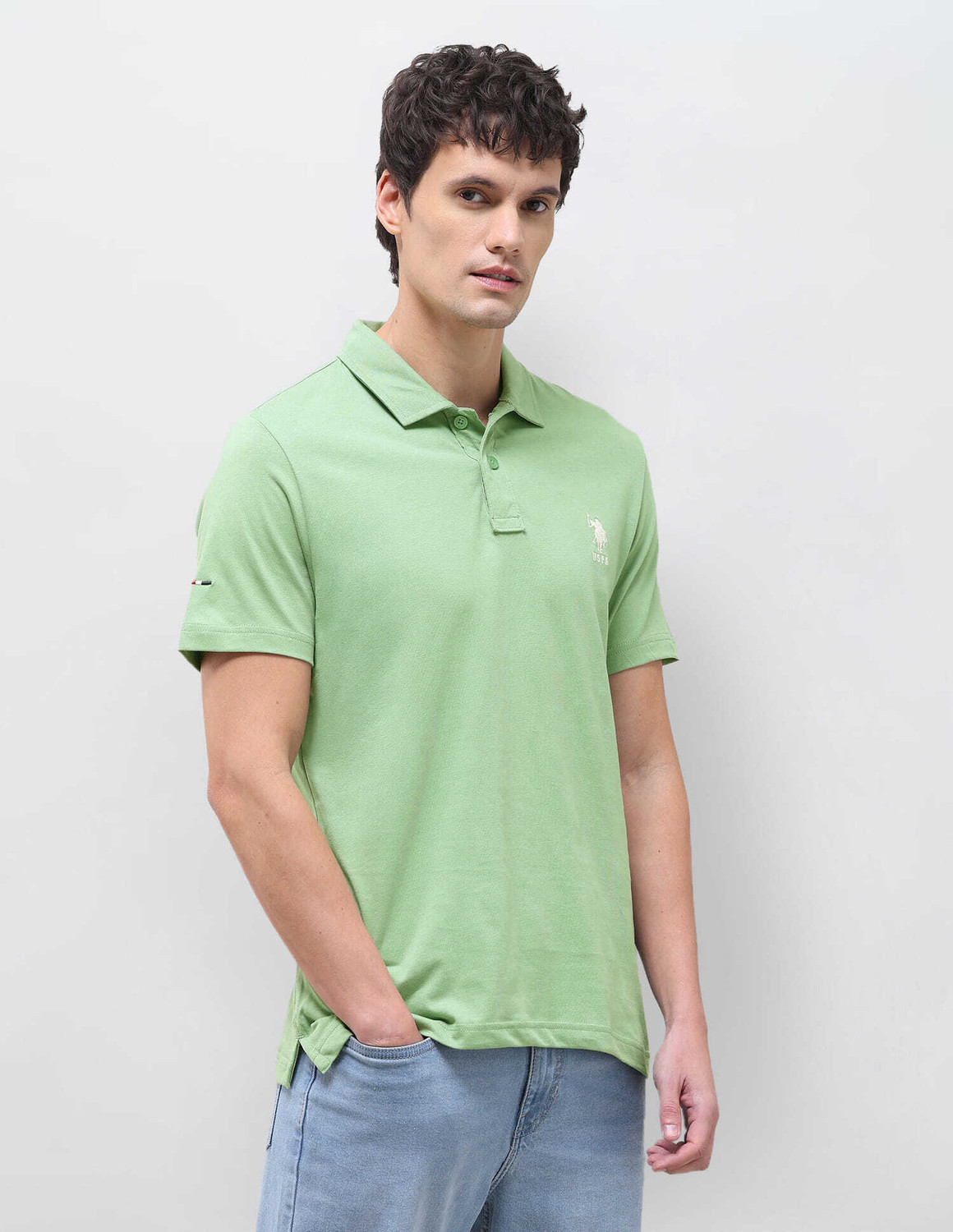 Image of U.S. Polo Assn. Denim Co. Solid Men Polo Neck Green T-Shirt
