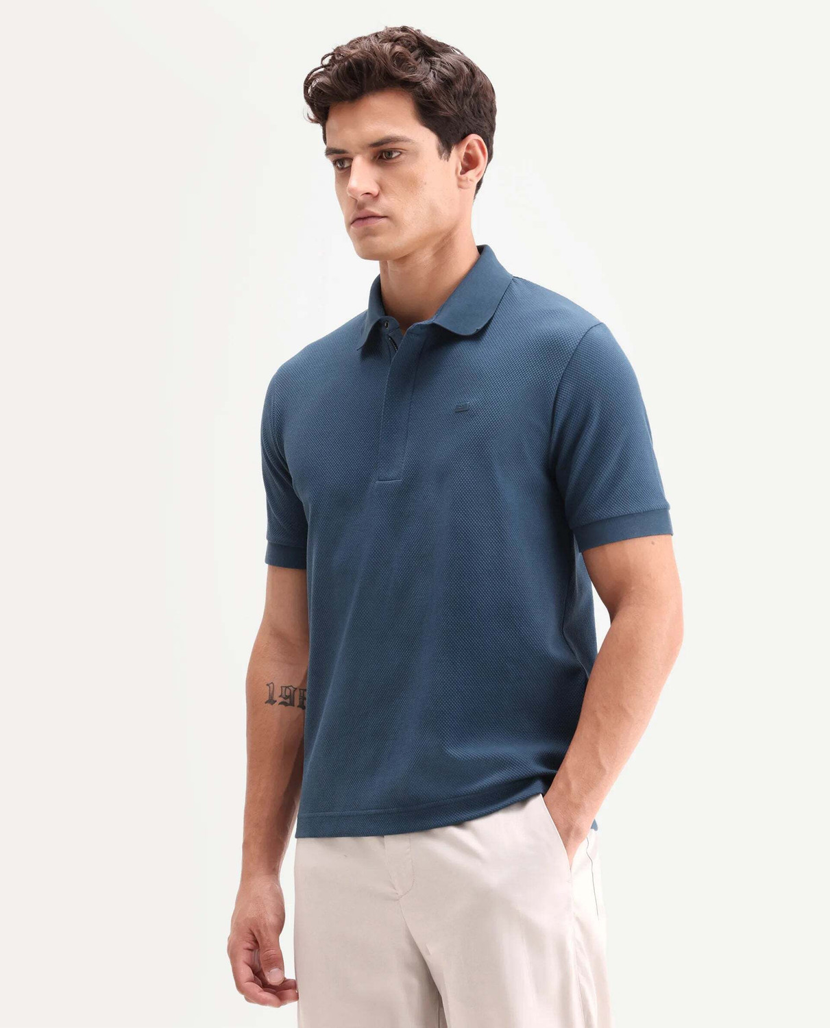Image of RARE RABBIT Solid Men Polo Neck Blue T-Shirt