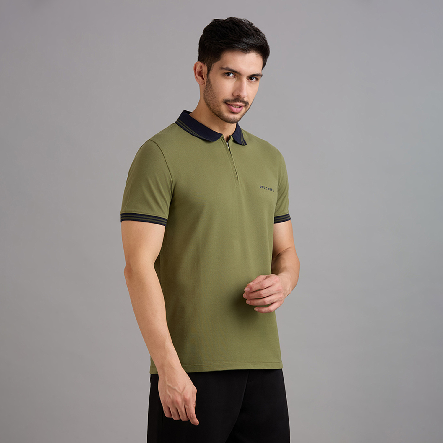 Image of Skechers Solid Men Polo Neck Green T-Shirt