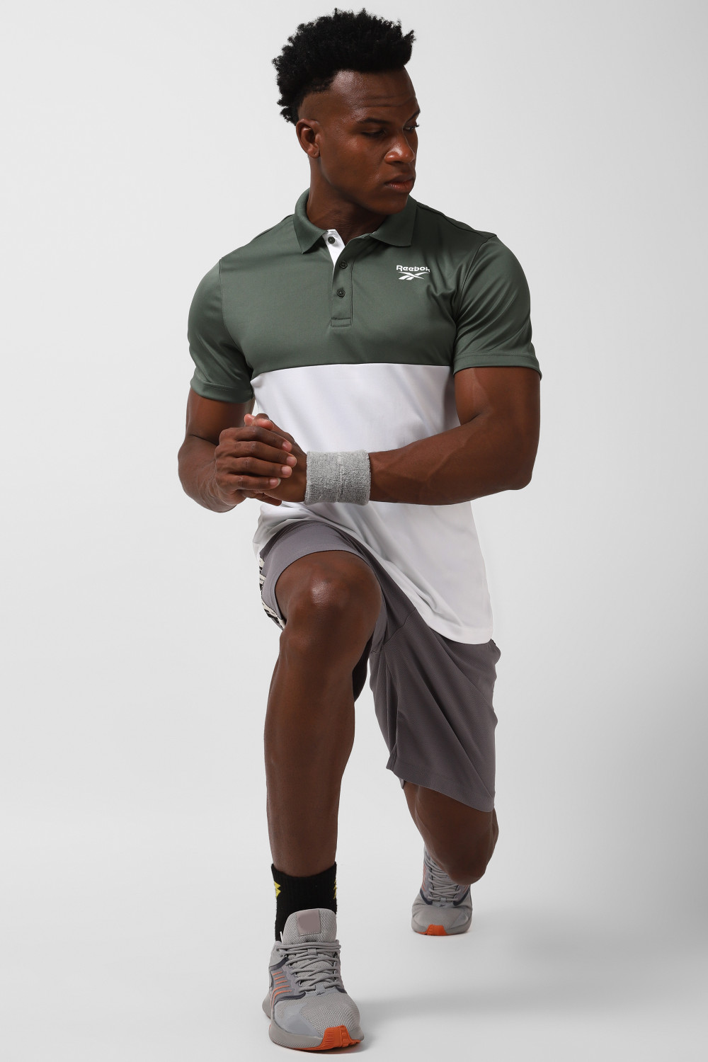Image of REEBOK Solid Men Mandarin Collar Black T-Shirt