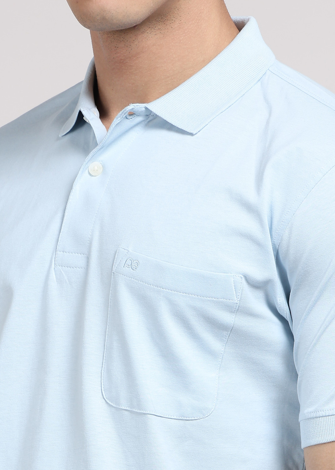 Image of PETER ENGLAND Men Solid Polo Neck Pure Cotton Blue T-Shirt
