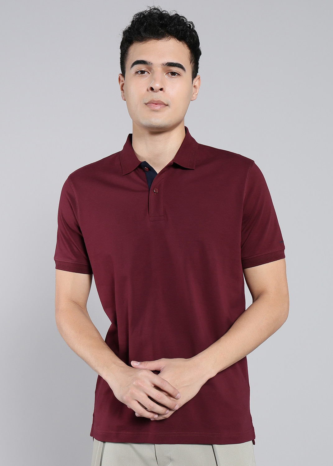 VAN HEUSEN SPORT Solid Men Polo Neck Maroon T-Shirt