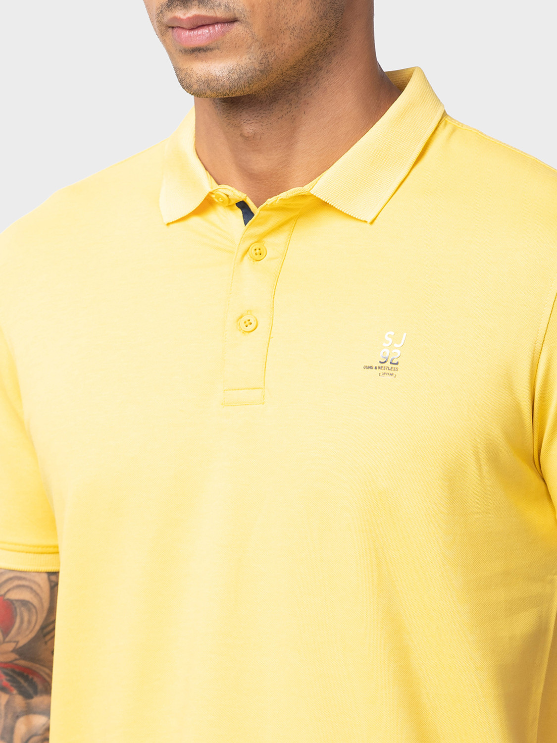 Image of Spykar Solid Men Polo Neck Yellow T-Shirt