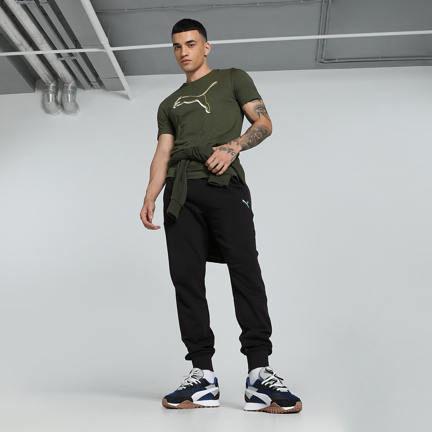 Image of PUMA Solid Men Crew Neck Green T-Shirt