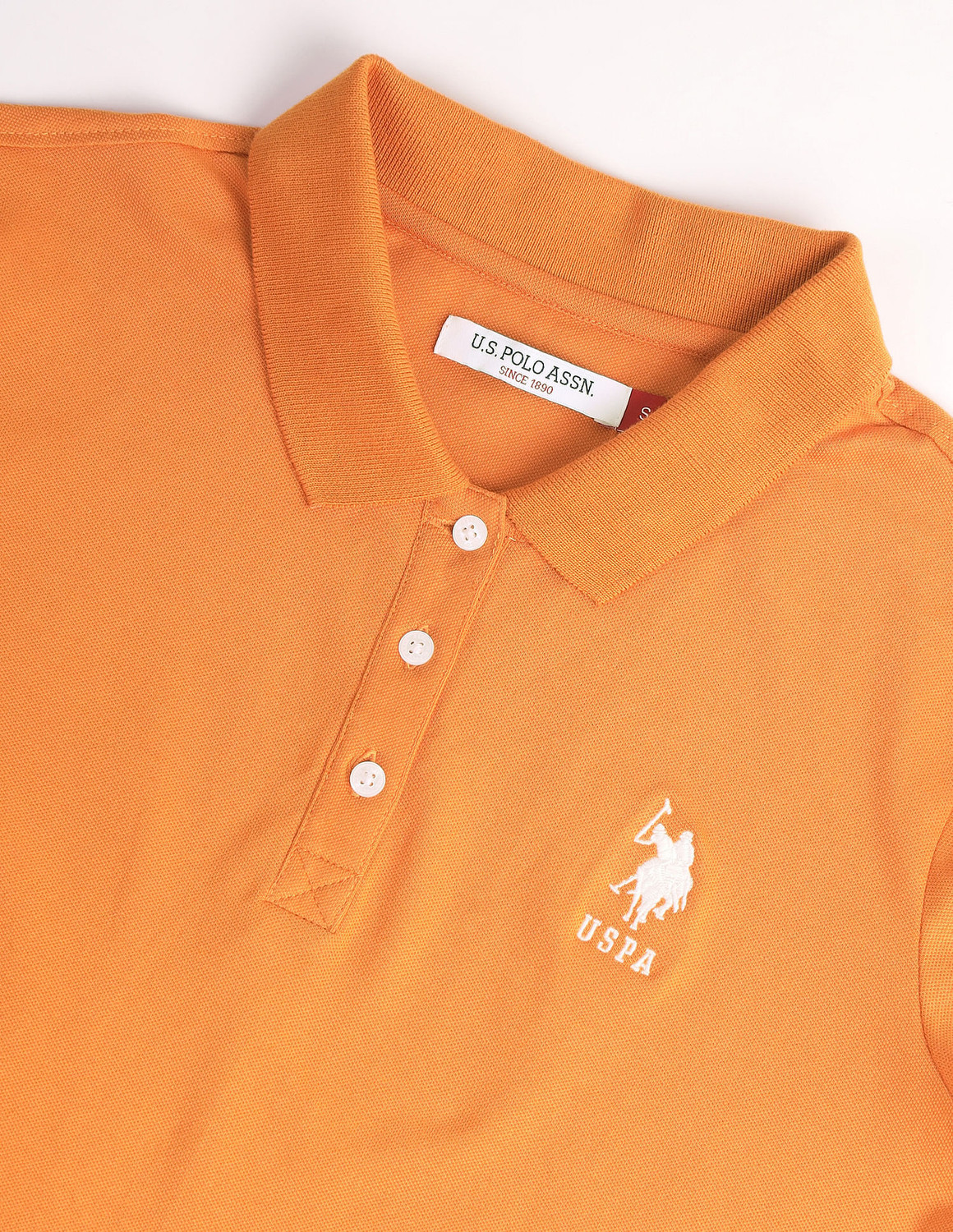 Image of U.S. POLO ASSN. Solid Women Polo Neck Yellow T-Shirt