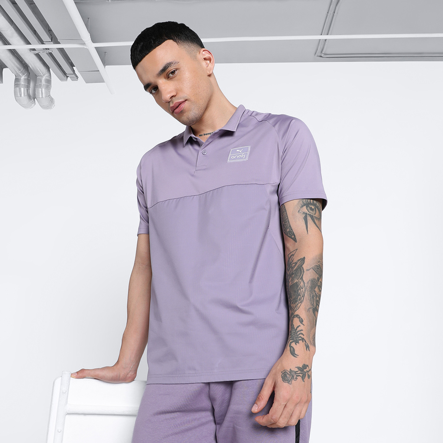 Image of PUMA Self Design Men Polo Neck Purple T-Shirt