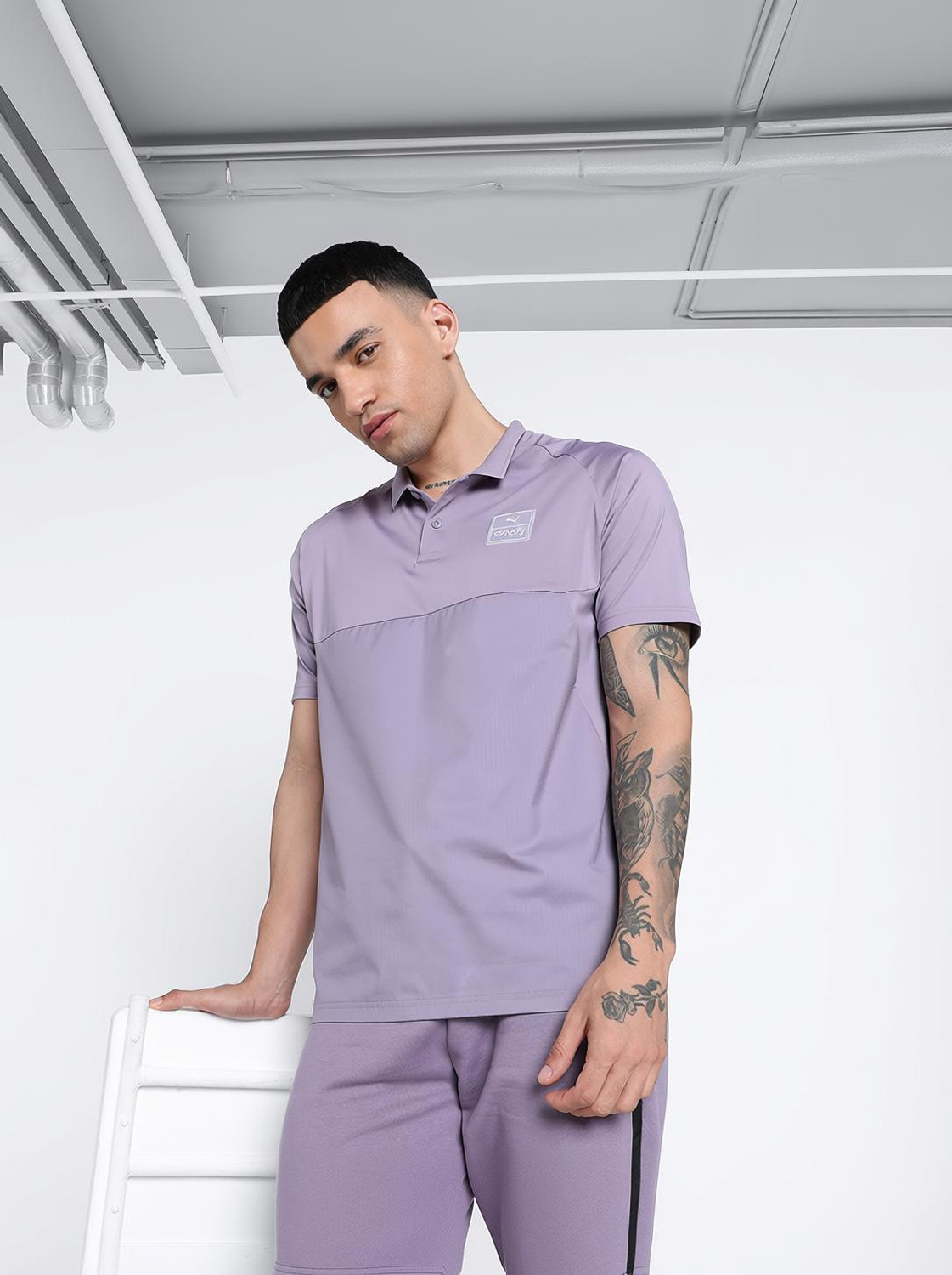 Image of PUMA Self Design Men Polo Neck Purple T-Shirt