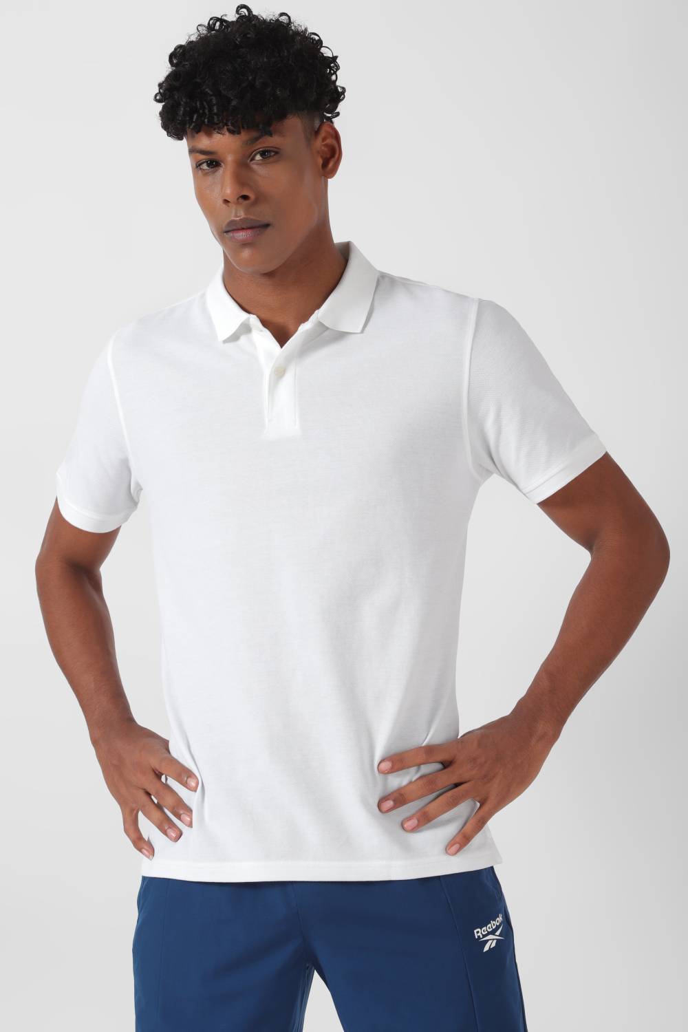 REEBOK Men Solid Polo Neck Cotton Blend White T-Shirt