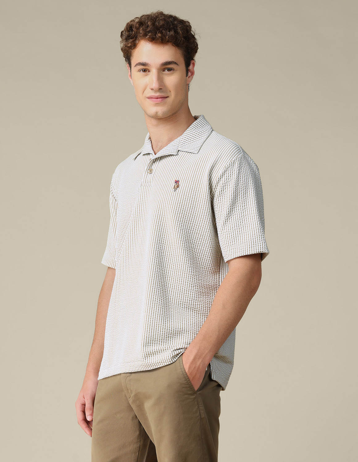 Image of U.S. Polo Assn. Denim Co. Men Self Design Polo Neck Cotton Blend Brown T-Shirt