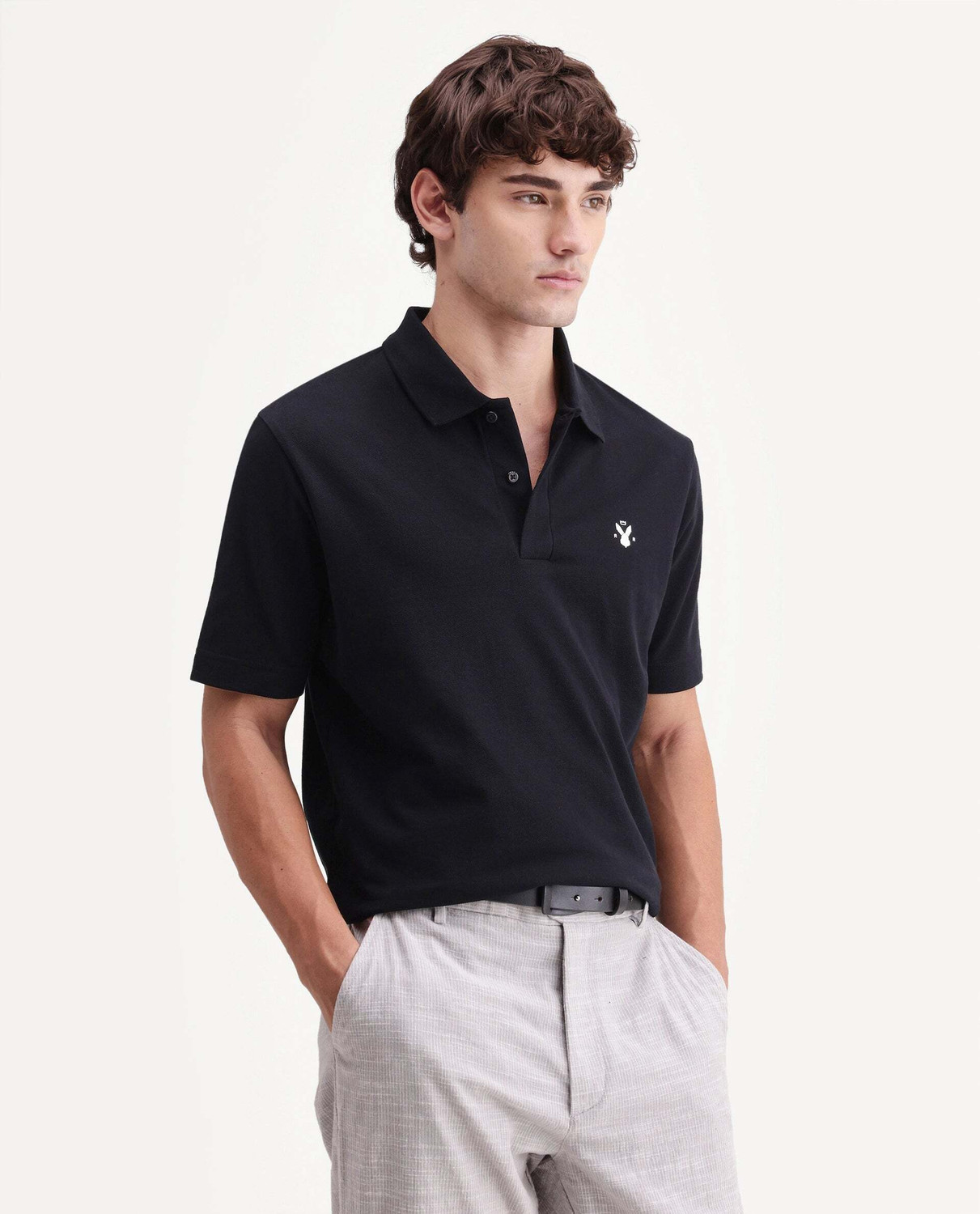 Image of RARE RABBIT Solid Men Polo Neck Black T-Shirt