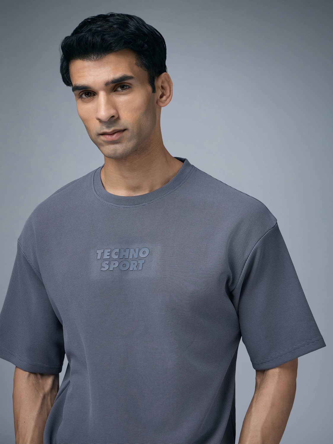 Image of TECHNOSPORT Self Design Men Round Neck Light Blue T-Shirt