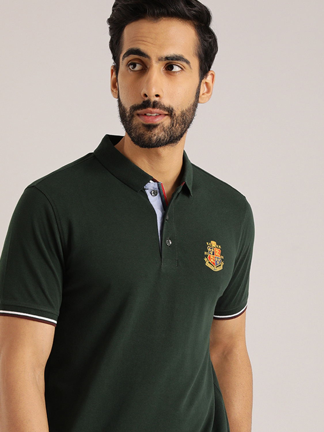 Image of INDIAN TERRAIN Solid Men Polo Neck Green T-Shirt