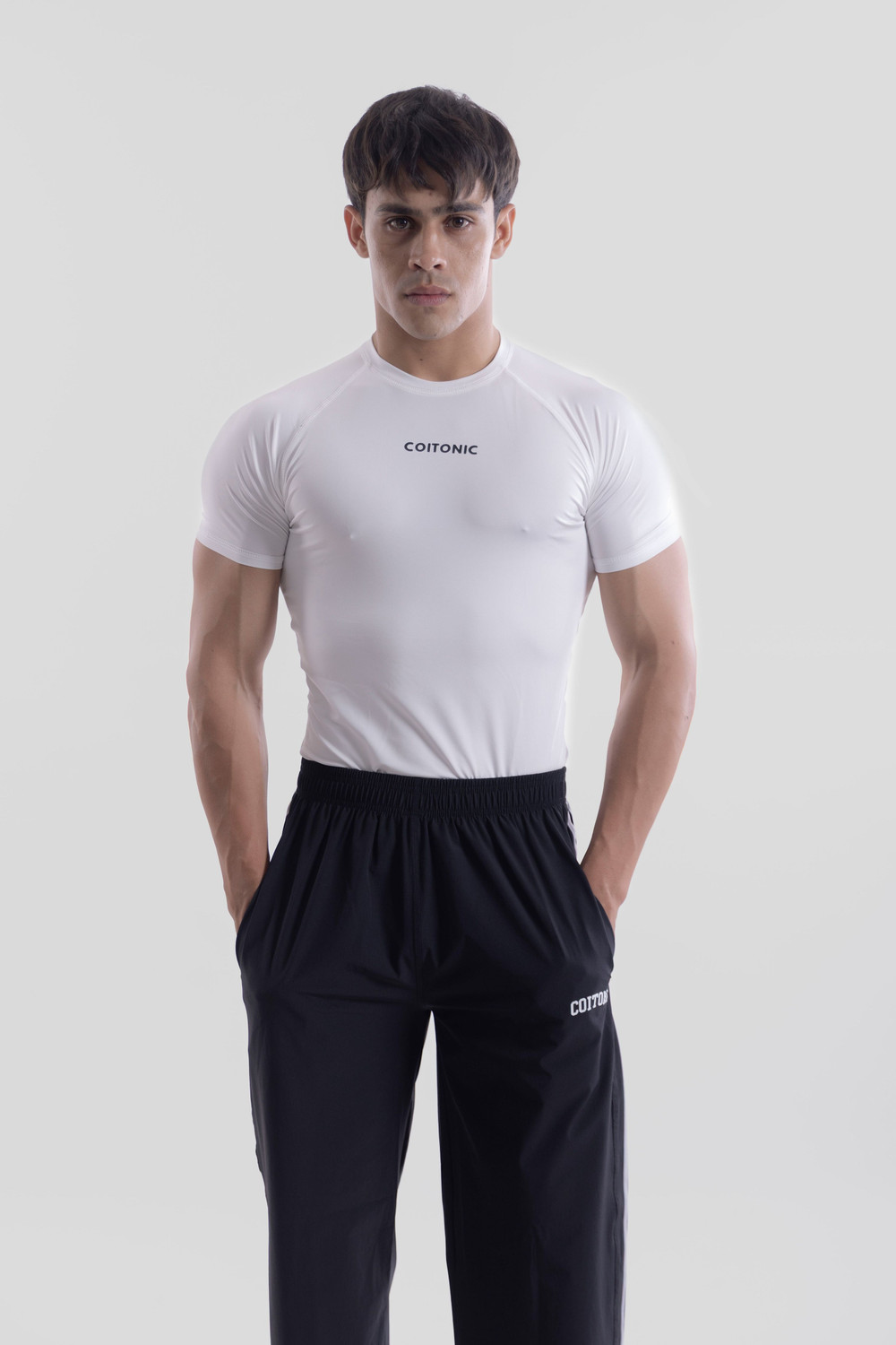 Image of COITONIC Solid Men Round Neck White T-Shirt