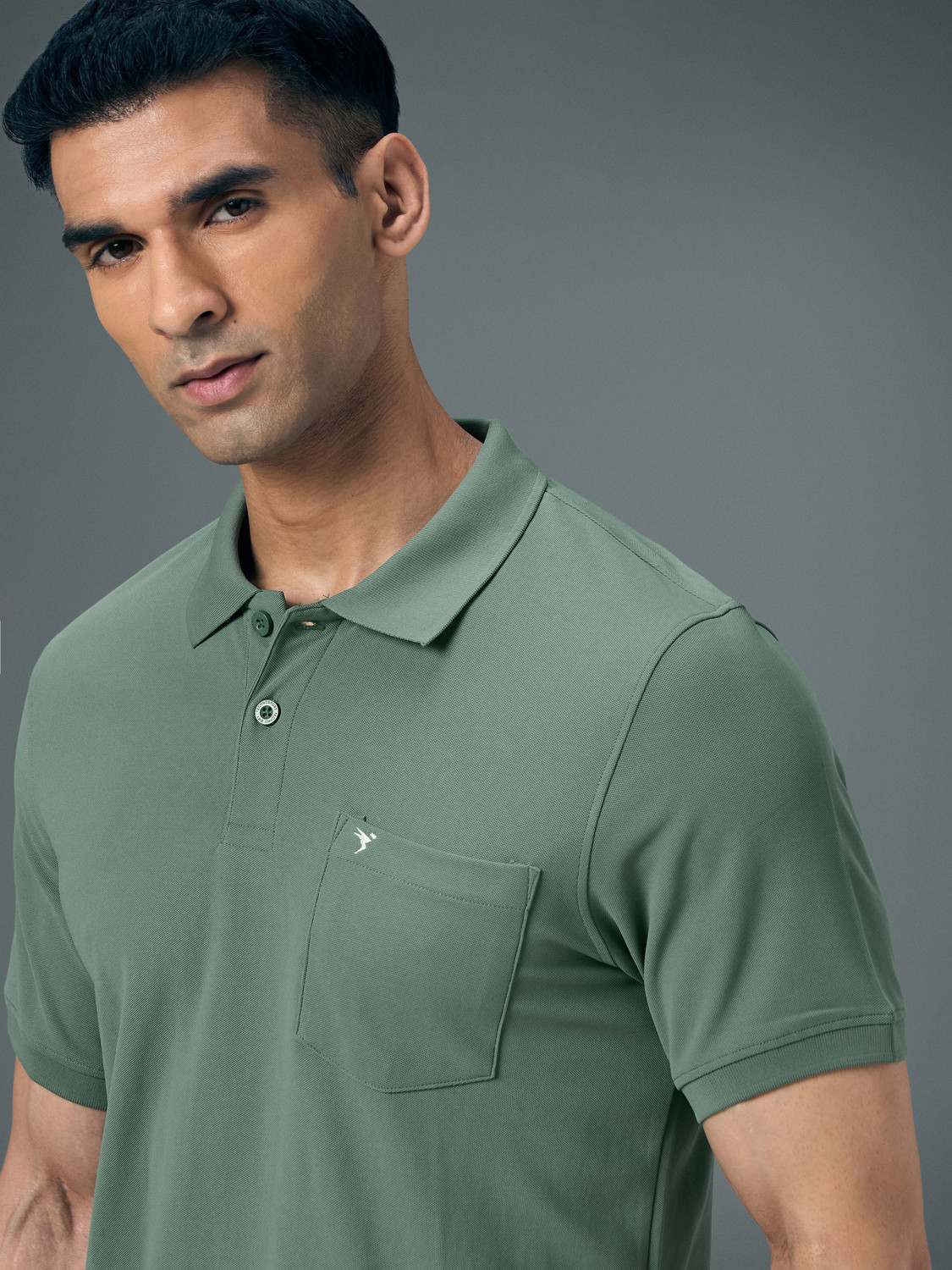 Image of TECHNOSPORT Solid Men Polo Neck Green T-Shirt