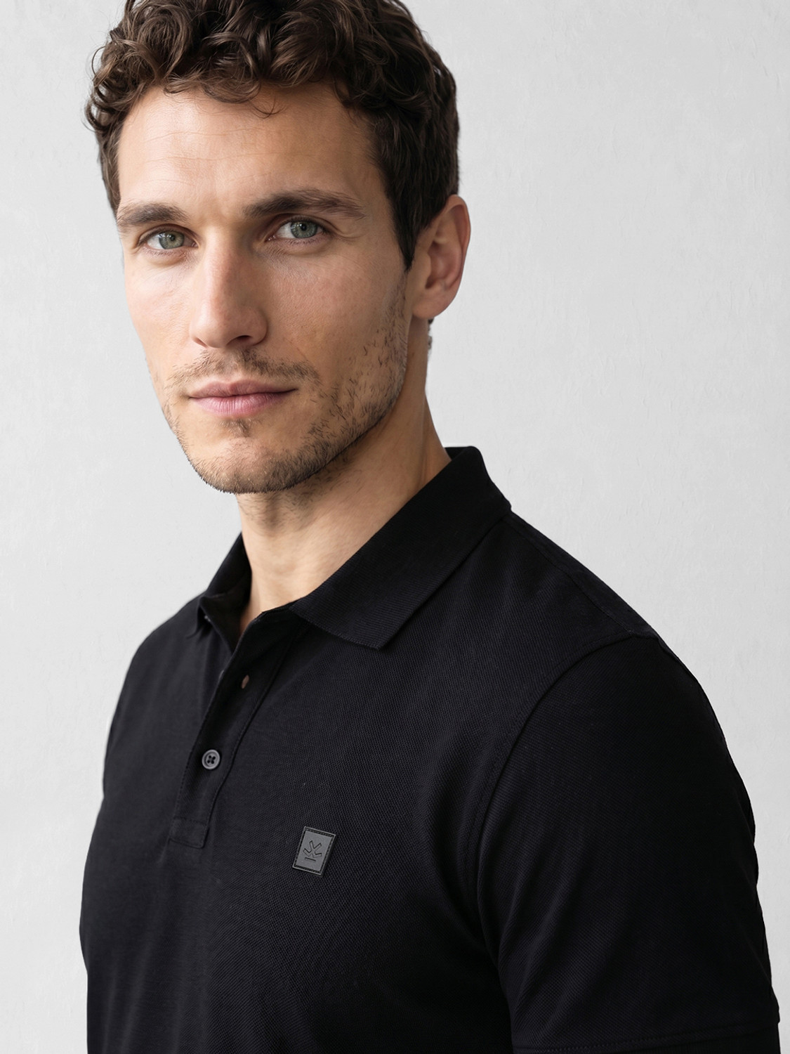 Image of WROGN Solid Men Polo Neck Black T-Shirt