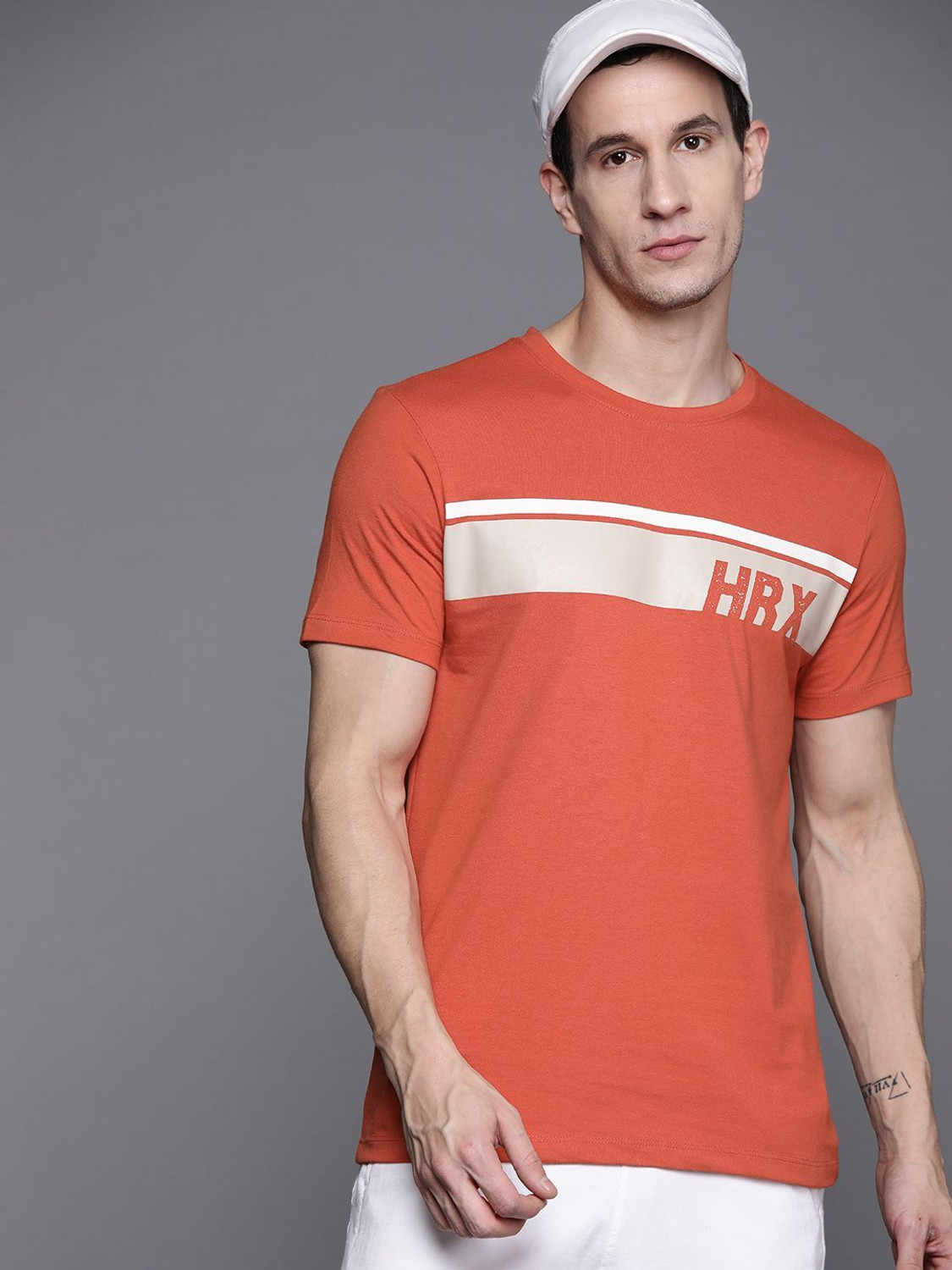 Image of HRX by Hrithik Roshan Printed Men Round Neck Orange T-Shirt