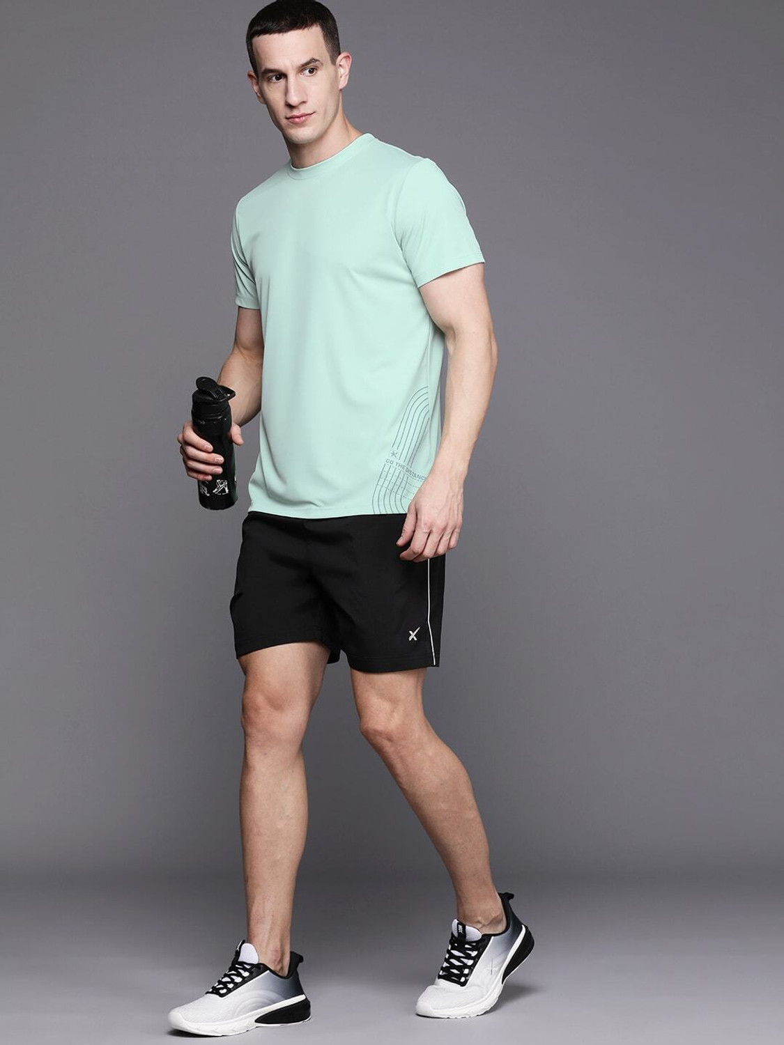 Image of HRX by Hrithik Roshan Solid Men Round Neck Green T-Shirt