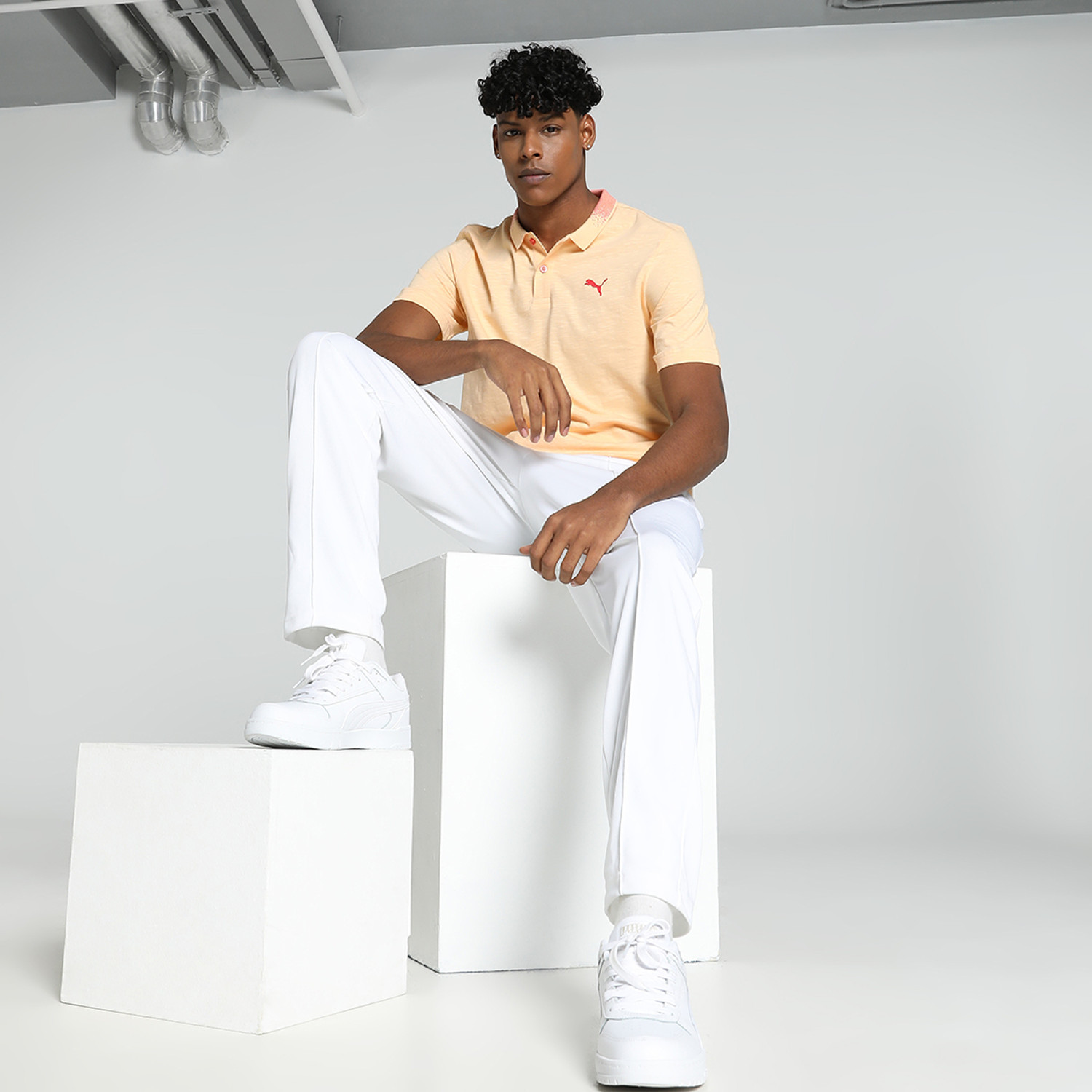 Image of PUMA Solid Men Polo Neck Orange T-Shirt