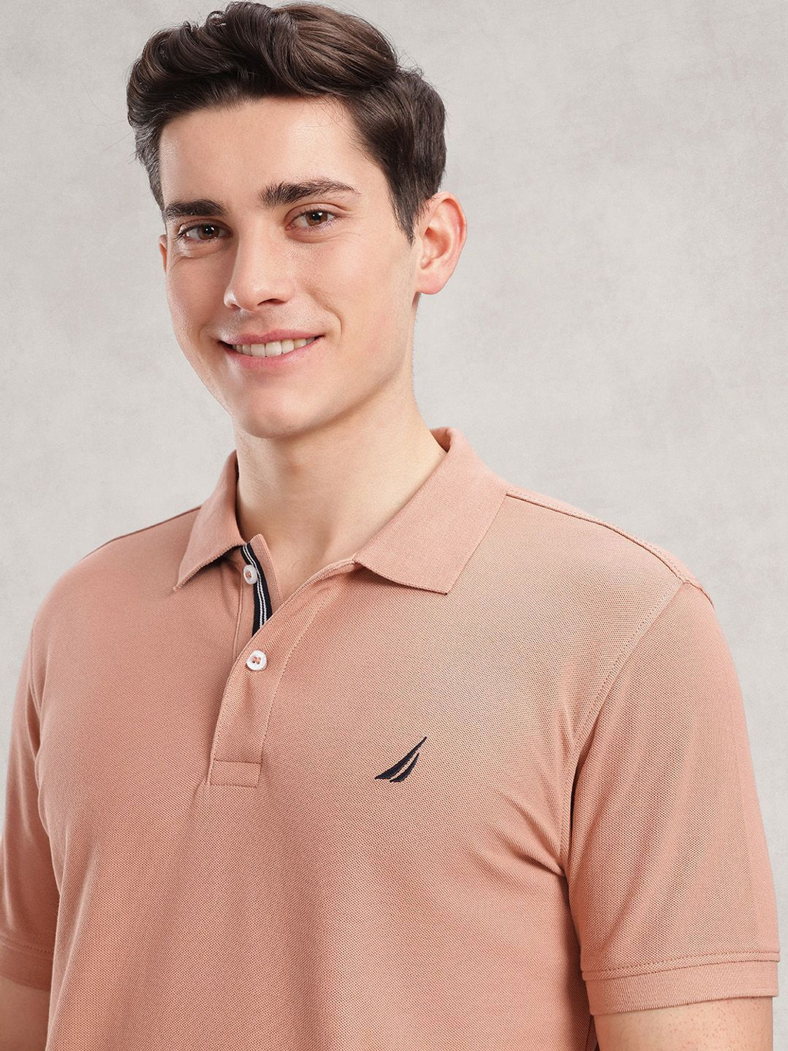 Image of NAUTICA Solid Men Polo Neck Orange T-Shirt