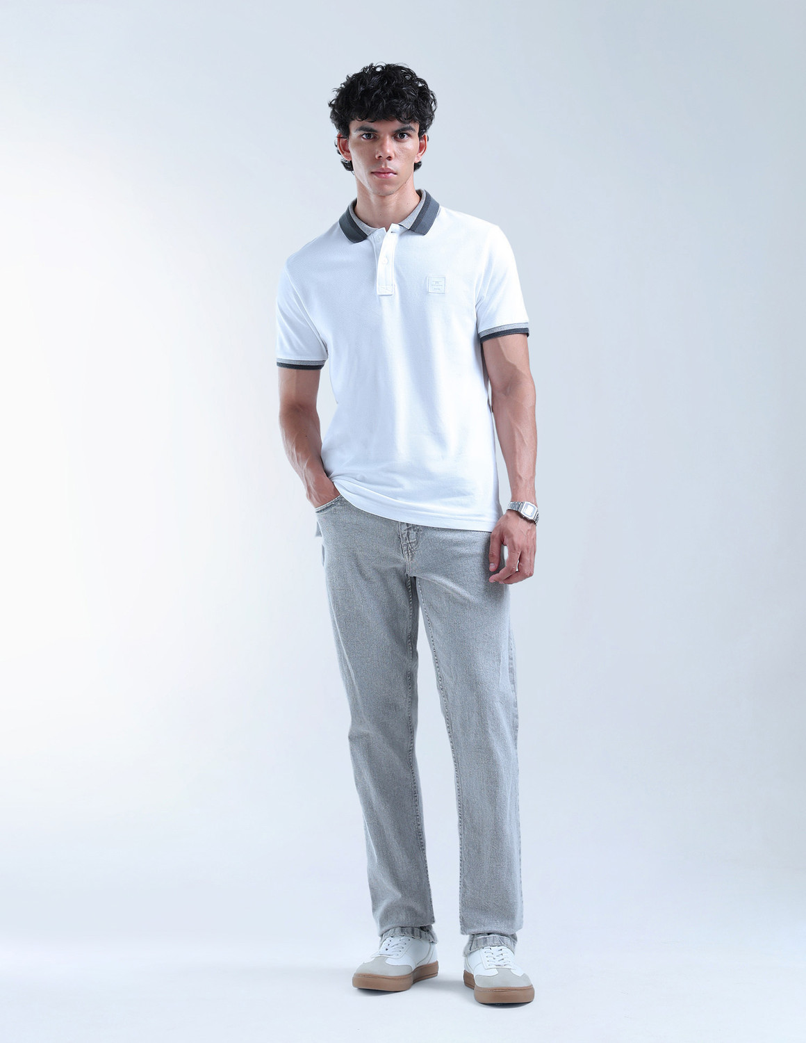 Image of FLYING MACHINE Solid Men Polo Neck White T-Shirt