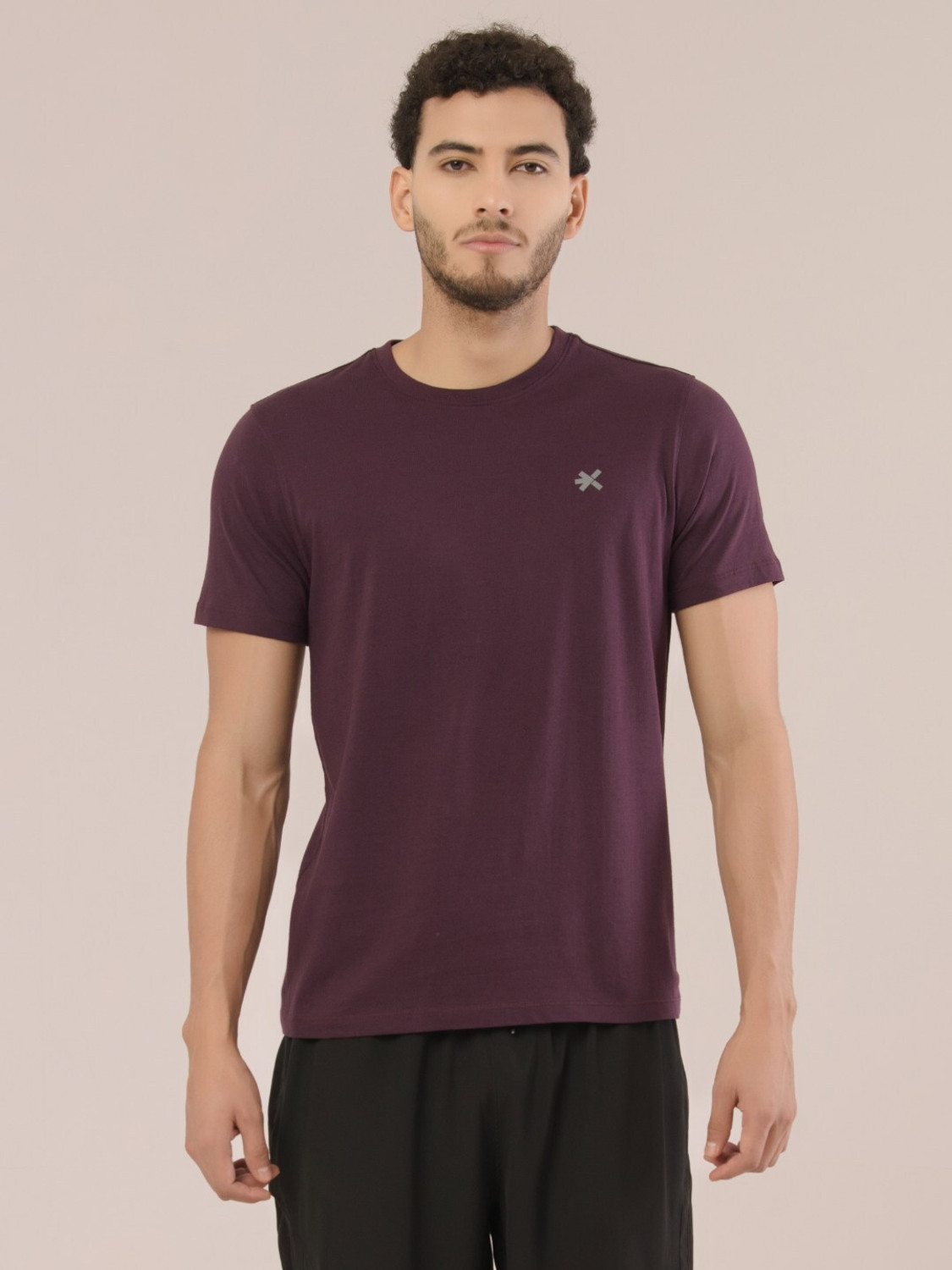 Image of HRX by Hrithik Roshan Solid Men Round Neck Purple T-Shirt