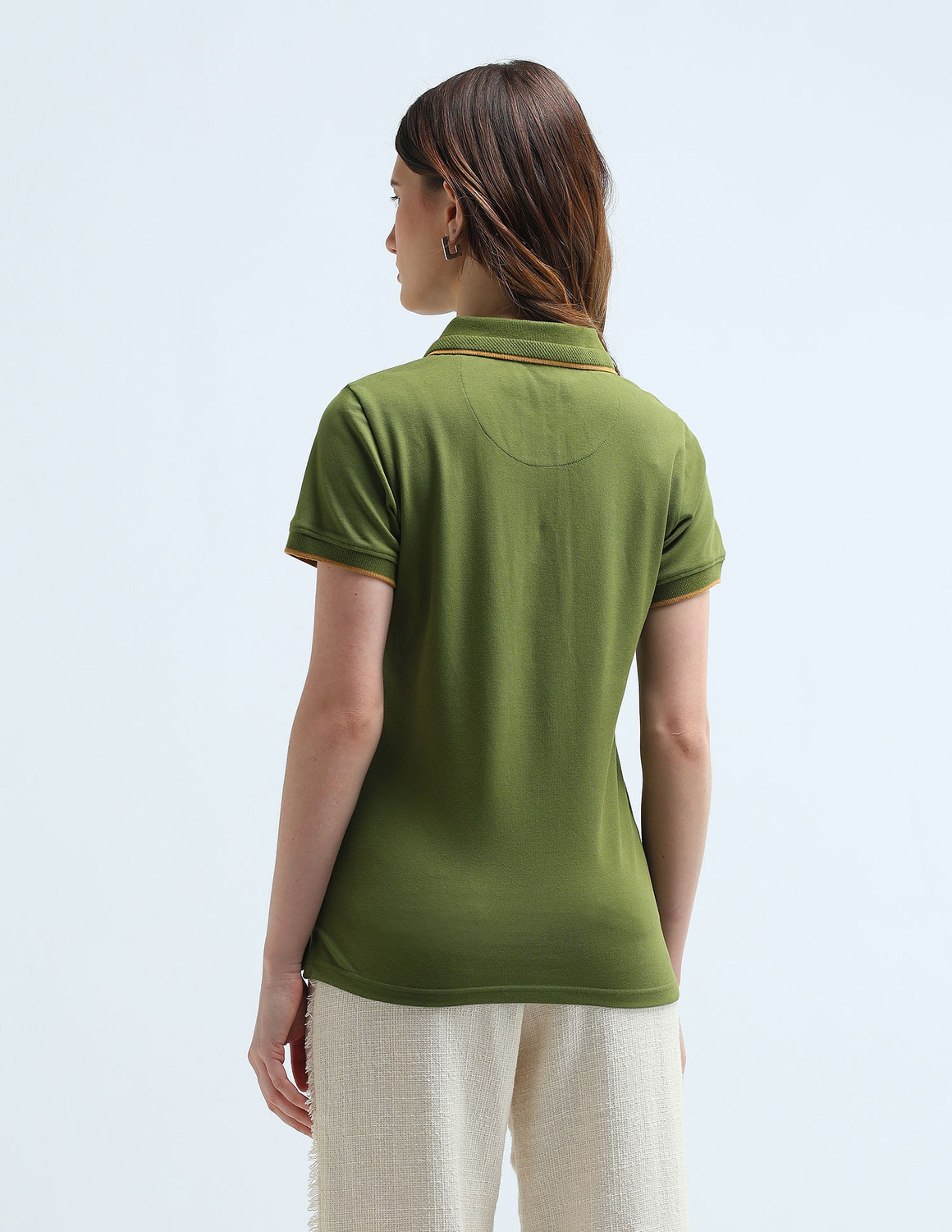 Image of U.S. POLO ASSN. Solid Women Polo Neck Green T-Shirt