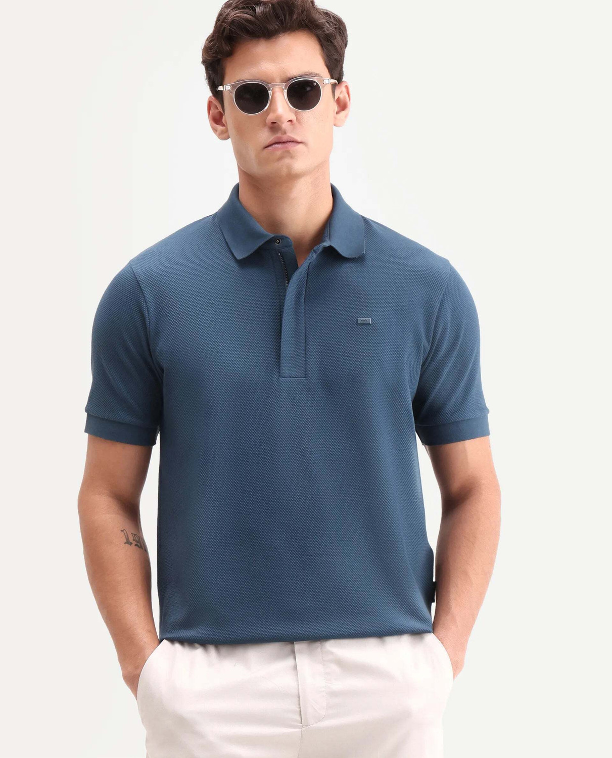 Image of RARE RABBIT Solid Men Polo Neck Blue T-Shirt