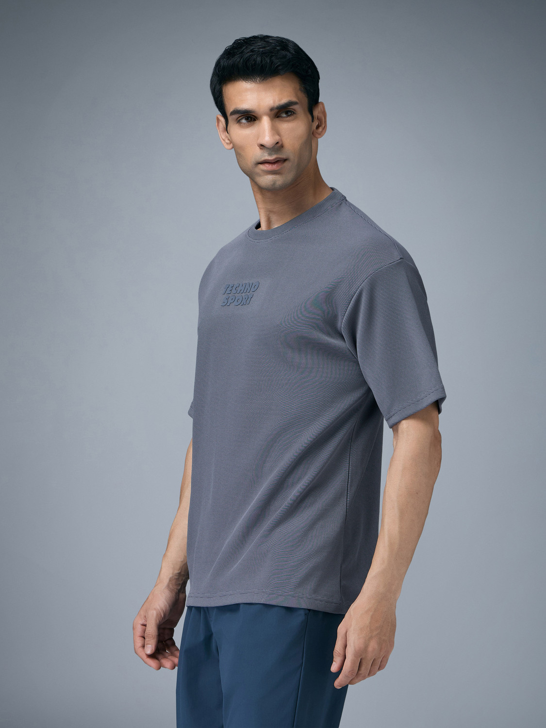Image of TECHNOSPORT Self Design Men Round Neck Light Blue T-Shirt