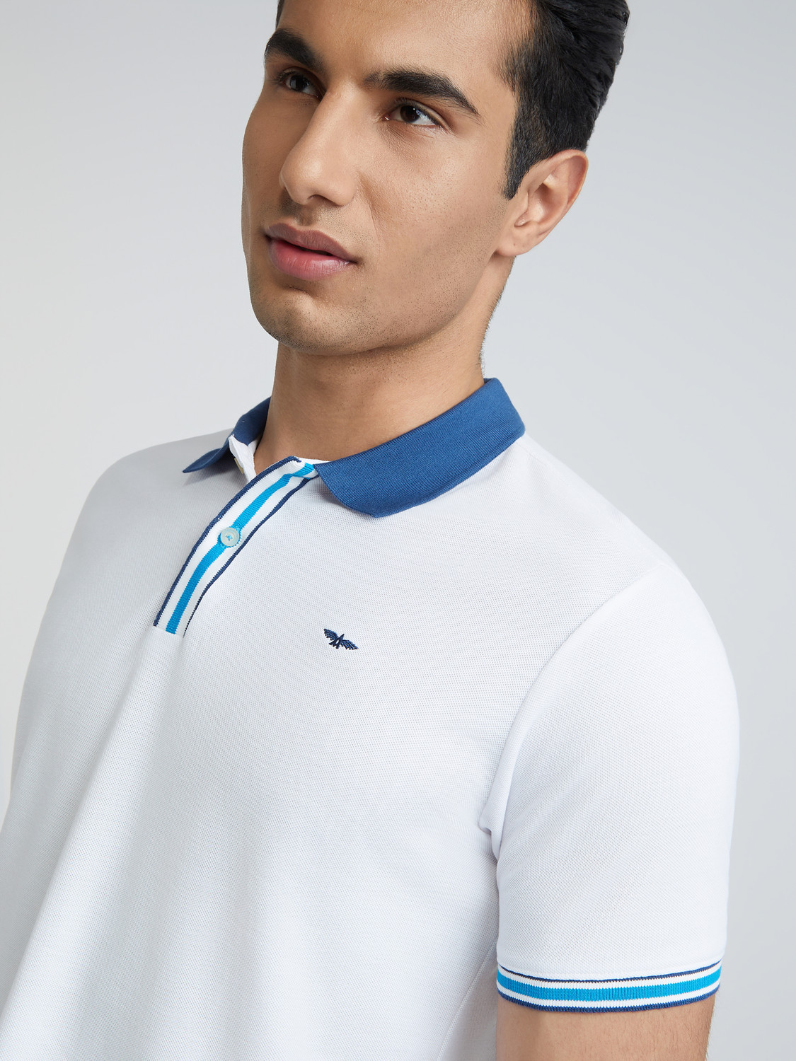 Image of PARK AVENUE Solid Men Polo Neck White T-Shirt