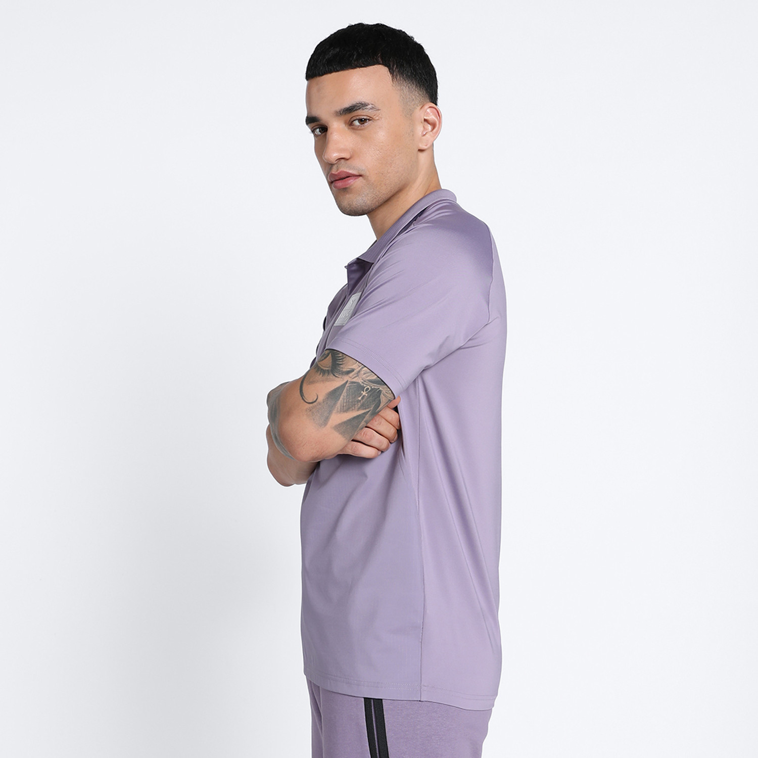 Image of PUMA Self Design Men Polo Neck Purple T-Shirt