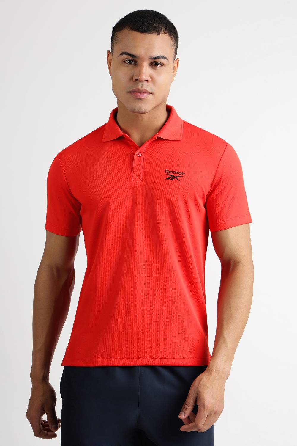 REEBOK Men Solid Polo Neck Polyester Red T-Shirt
