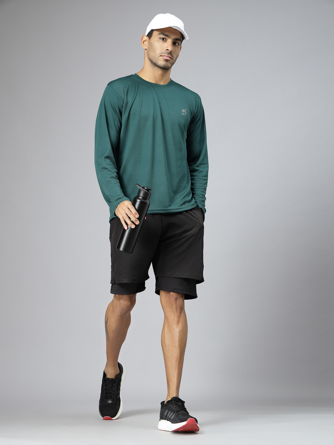 Image of HRX by Hrithik Roshan Solid Men Round Neck Green T-Shirt
