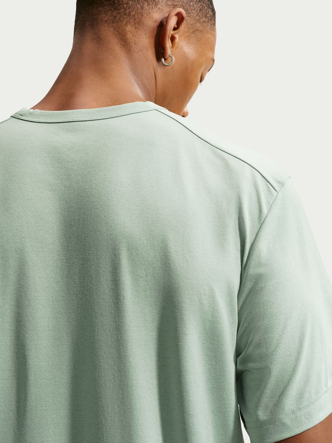 Image of NIKE Solid Men Crew Neck Light Green T-Shirt