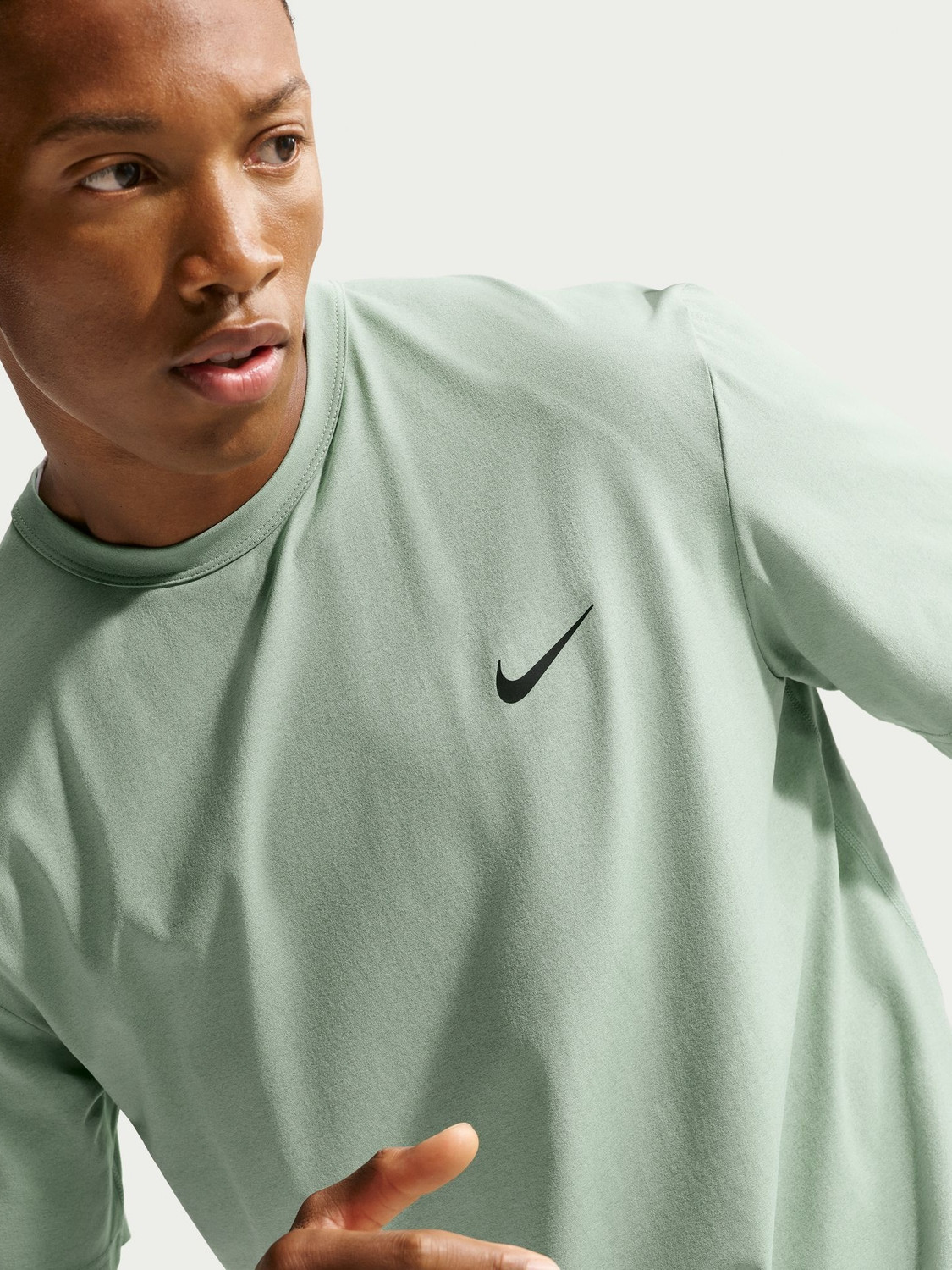 Image of NIKE Solid Men Crew Neck Light Green T-Shirt