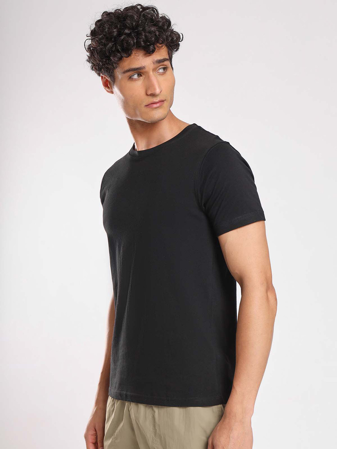 Image of NOBERO Solid Men Round Neck Black T-Shirt