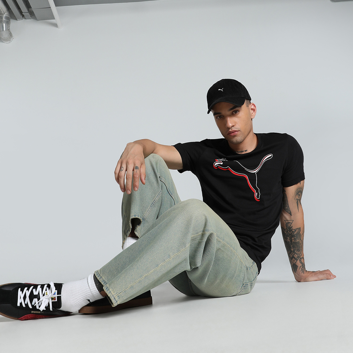 Image of PUMA Solid Men Crew Neck Black T-Shirt