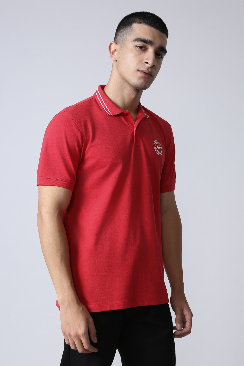 Image of REEBOK Men Solid Polo Neck Polyester Red T-Shirt