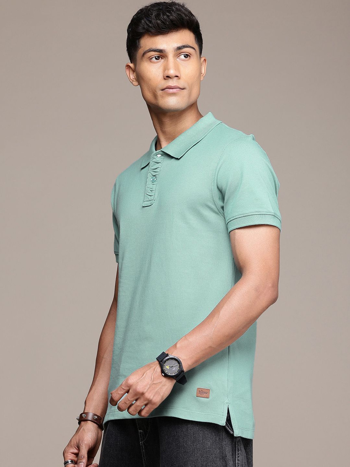 Image of Roadster Solid Men Polo Neck Green T-Shirt