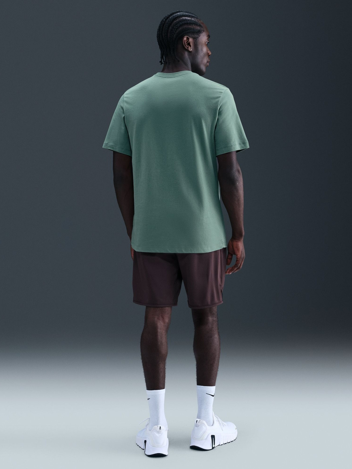 Image of NIKE Solid Men Round Neck Green T-Shirt
