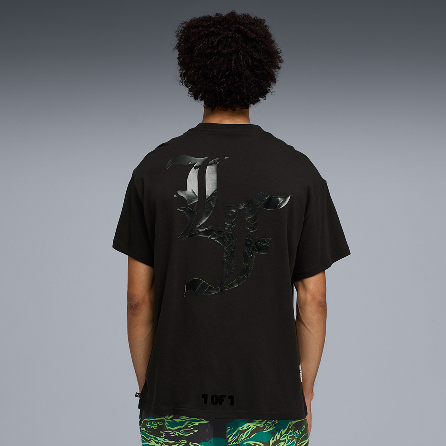 Image of PUMA Printed Men Crew Neck Black T-Shirt