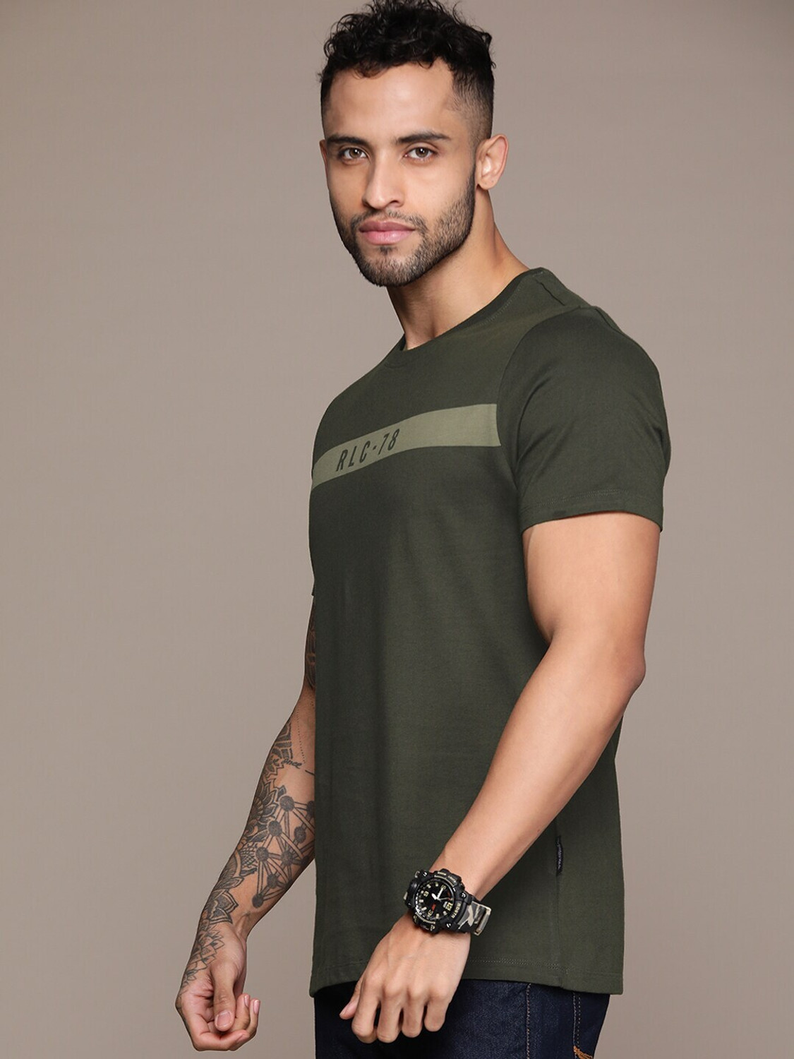 Image of Roadster Solid Men Round Neck Green T-Shirt