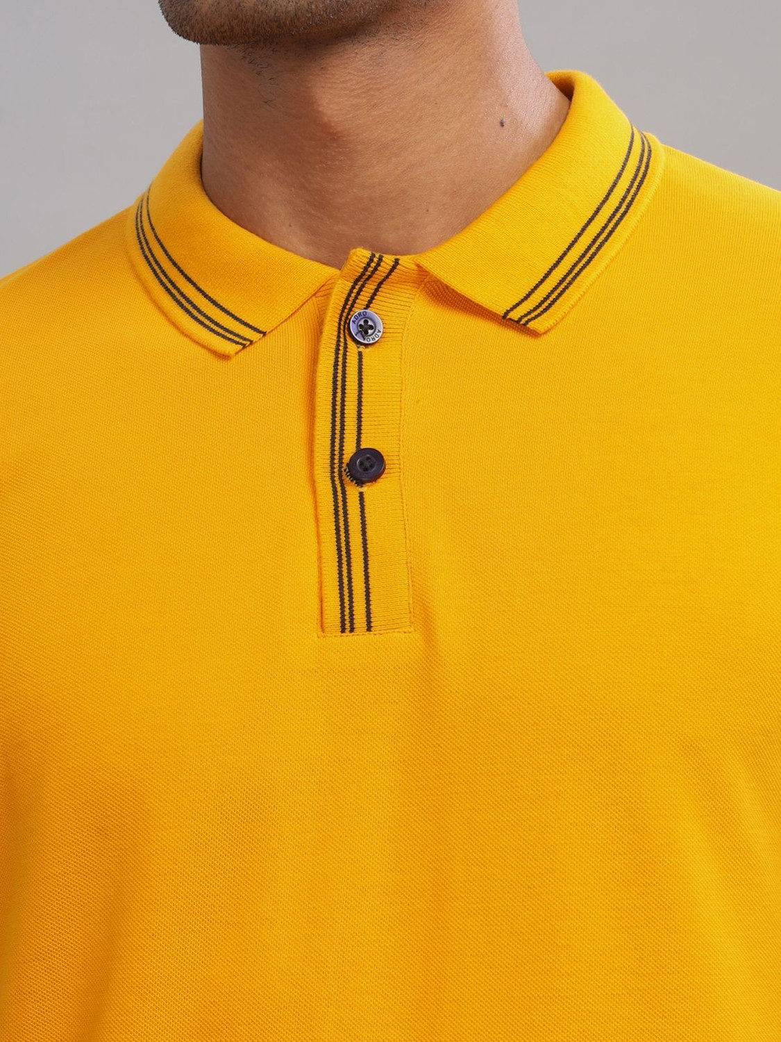 Image of ADRO Solid Men Polo Neck Yellow T-Shirt
