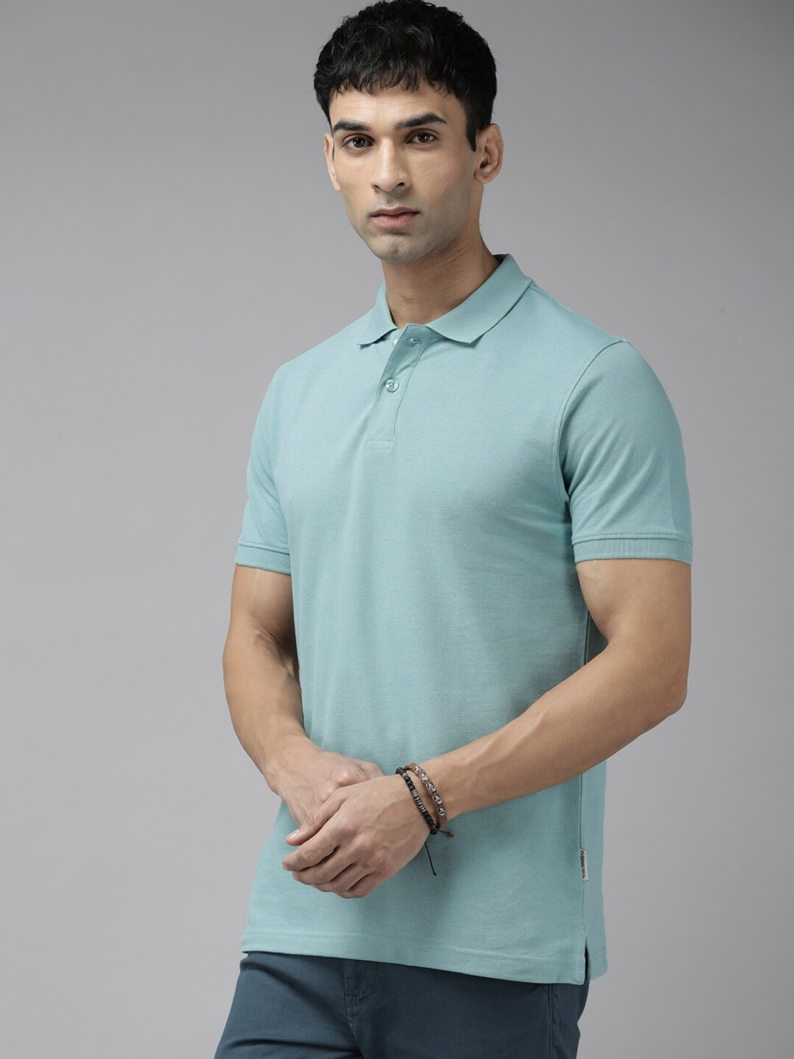 Image of Roadster Solid Men Polo Neck Yellow T-Shirt