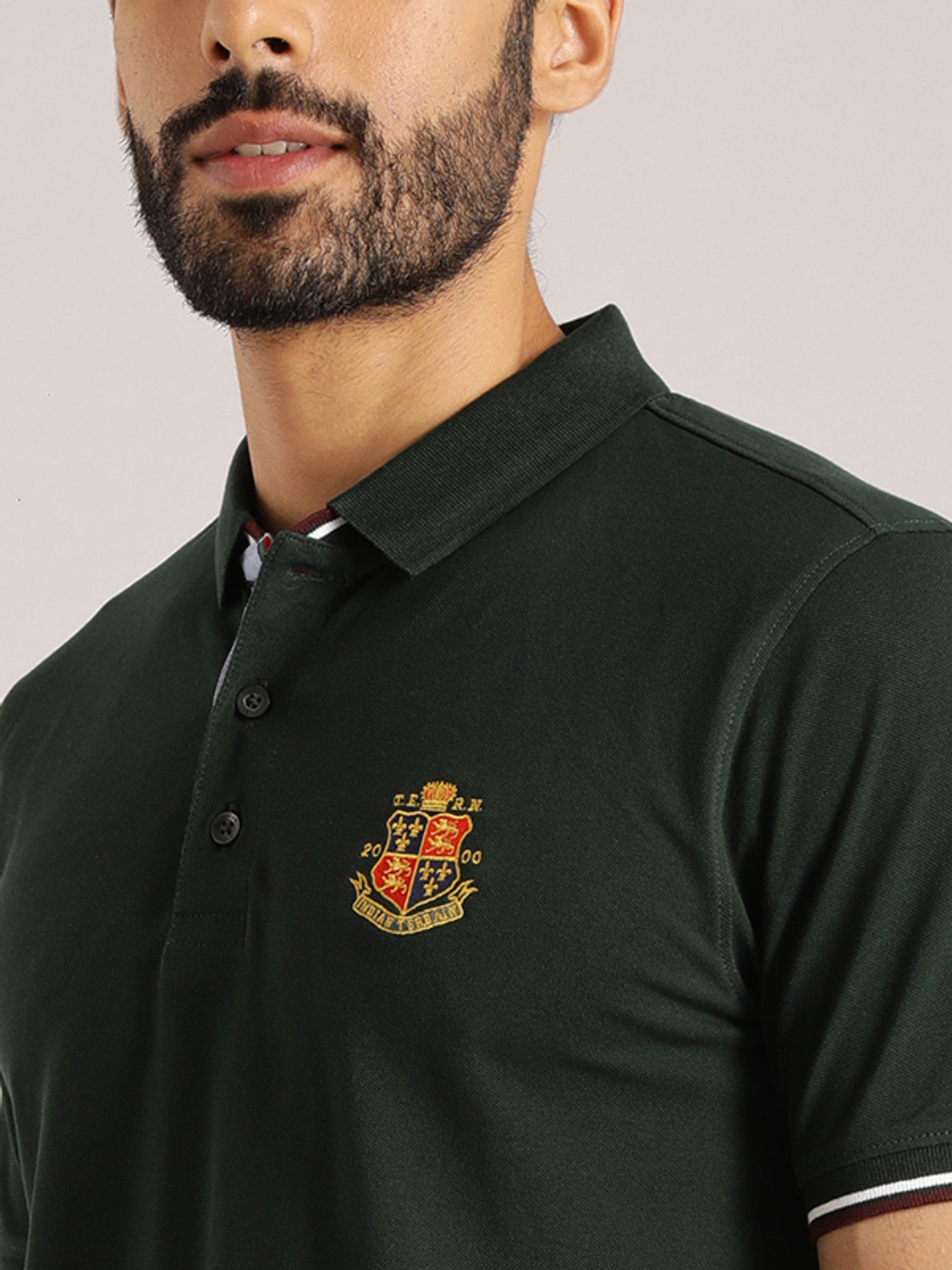 Image of INDIAN TERRAIN Solid Men Polo Neck Green T-Shirt