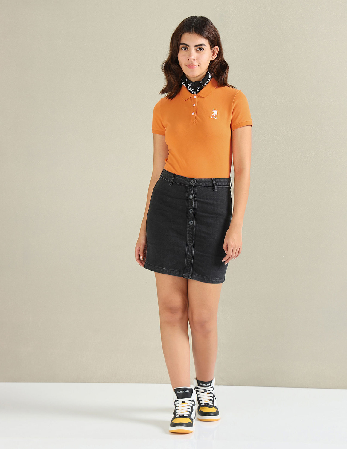 Image of U.S. POLO ASSN. Solid Women Polo Neck Yellow T-Shirt